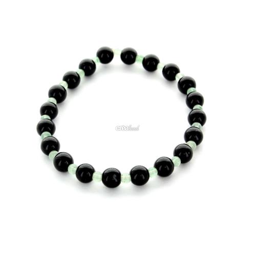 bracelet en jade noir et vert, une pierre naturelle réputée pour ses propriétés apaisantes et équilibrantes.